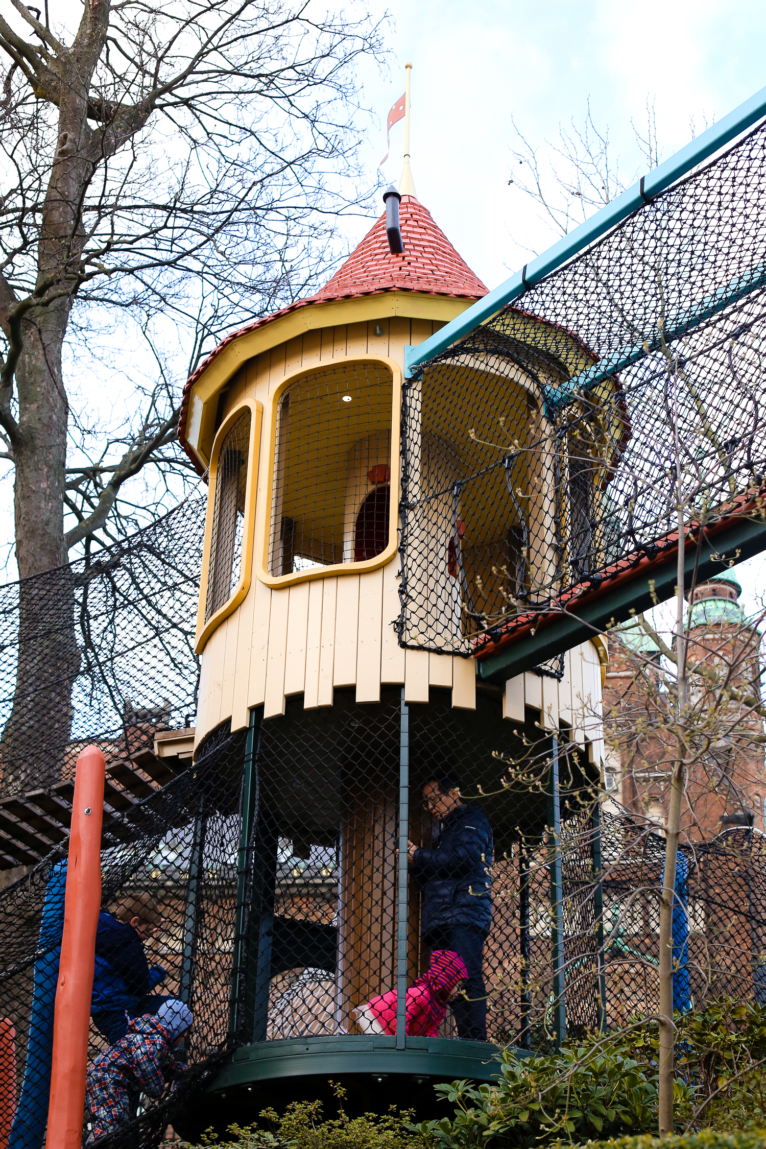 Don't miss out on taking your kids to the children's playground at Tivoli Gardens in Copenhagen, Denmark - it's full of surprises!