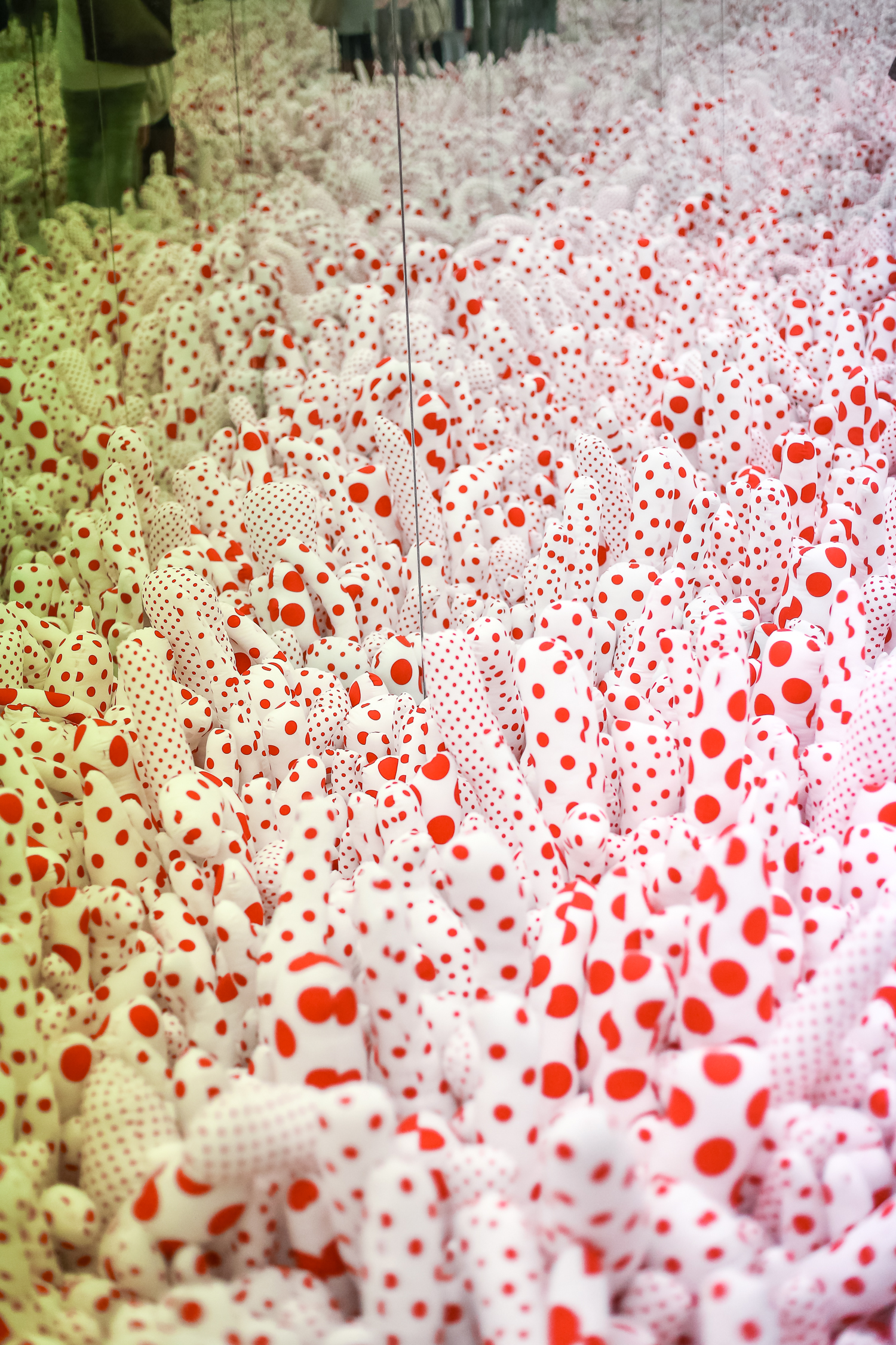 Tips and tricks for visiting the Yayoi Kusama exhibit with children at the Hirshhorn Museum in Washington, DC.