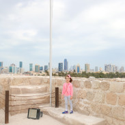 A toddler travels to Bahrain.